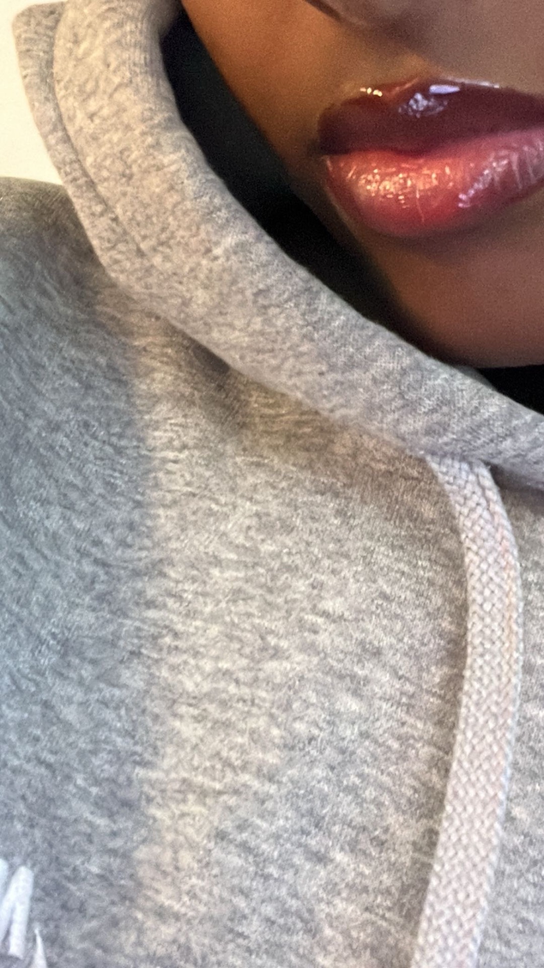 HALIMA wearing Lunnaré lip gloss